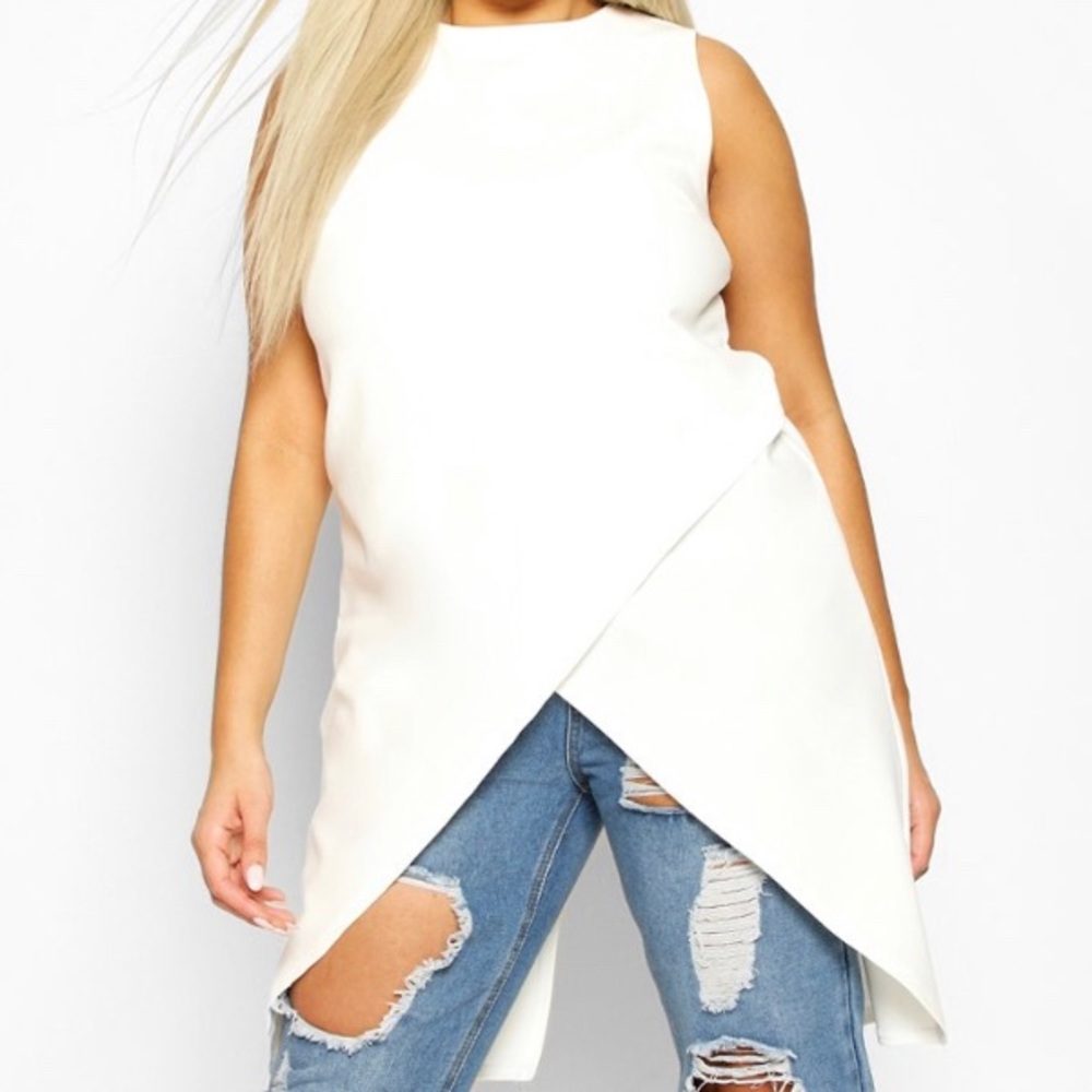 Ivory short sleeve elongated back revealing top